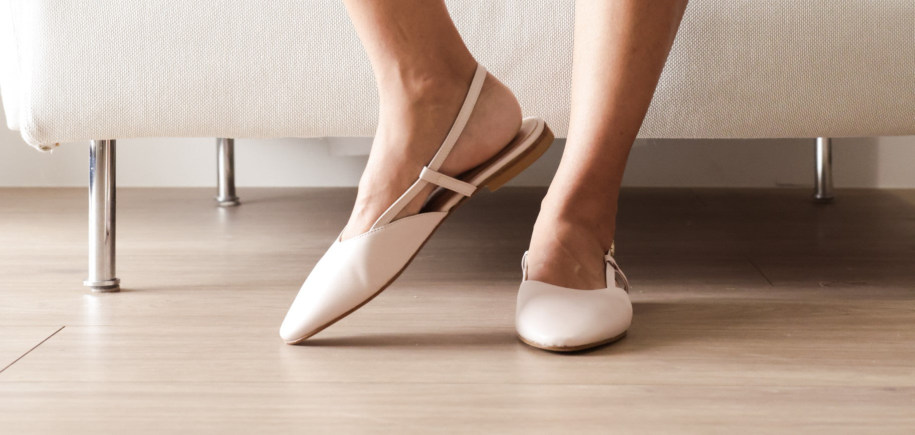Model wearing Capri Slingbacks.