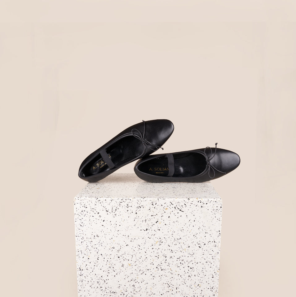 Black leather ballerina flats