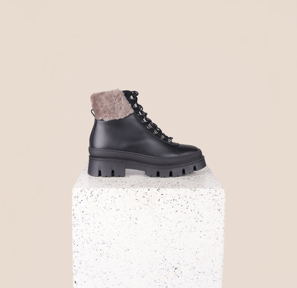 Moena Black Leather Shearling Lug Sole Boots Side View 