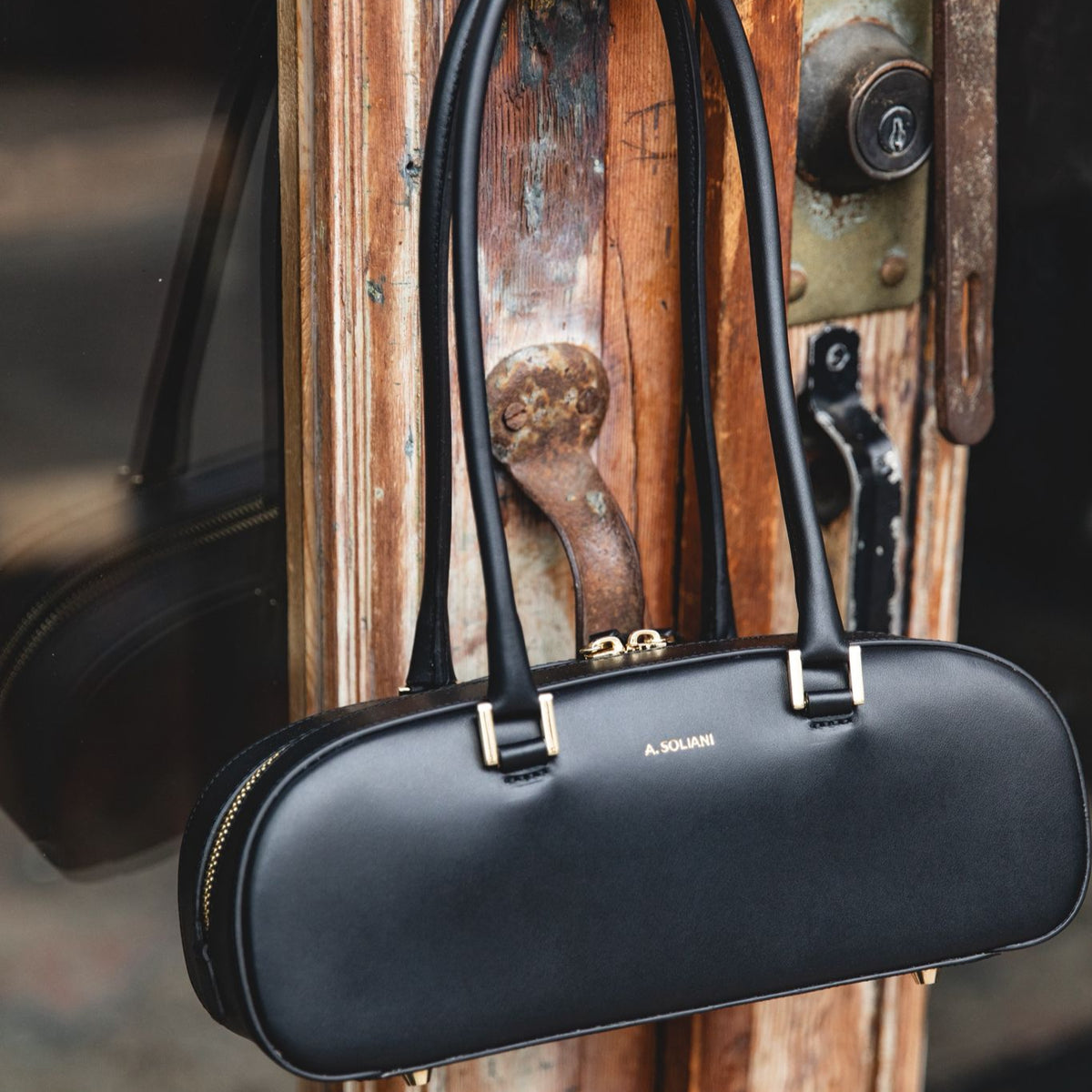 Riva-Black Leather